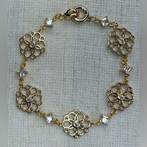 Elegant floral bracelet,real gold plated w clear CZ stones & spacers.7.75